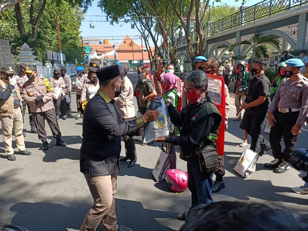 Waka Polda Kukuhkan Ojol sebagai Pengemudi Tangguh Covid-19